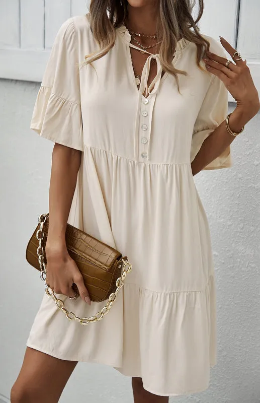 Relaxed Elegance: V-Neck Ruffle Mini Dress - Hurry, Shop Now!