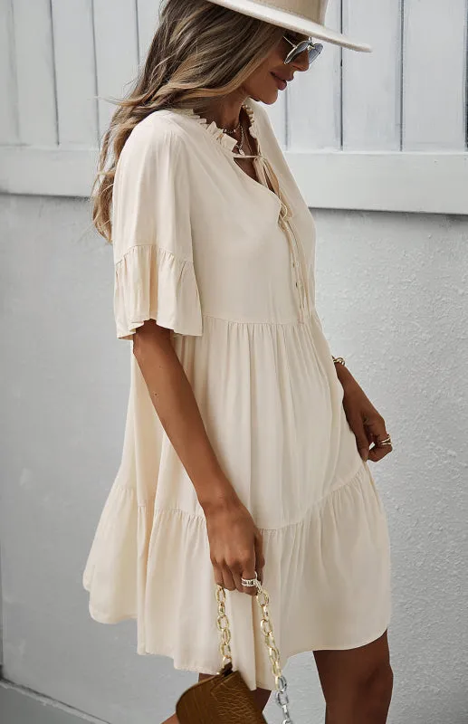 Relaxed Elegance: V-Neck Ruffle Mini Dress - Hurry, Shop Now!
