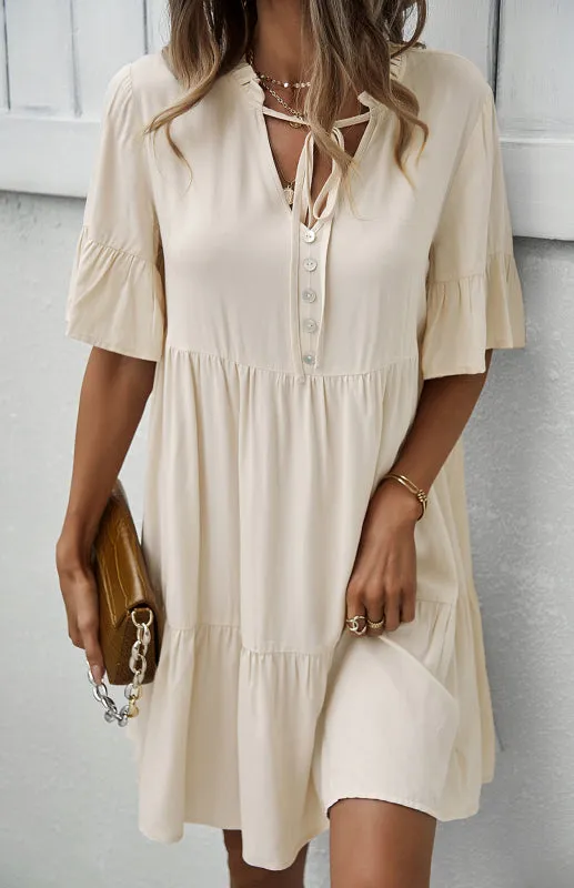 Relaxed Elegance: V-Neck Ruffle Mini Dress - Hurry, Shop Now!